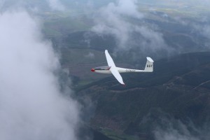 David Gill in the Vega with its tips on over Snowdonia