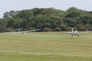 The Ralley taking off with the Single seat astir behind it